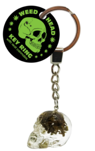 Weed Head Key Ring With Cannabis real cannabis bud in a skull shaped key ring